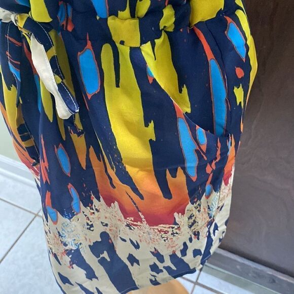 Off the shoulder Retro Dress with tie waist, pockets, & back cut out accent. - Picture 4 of 8